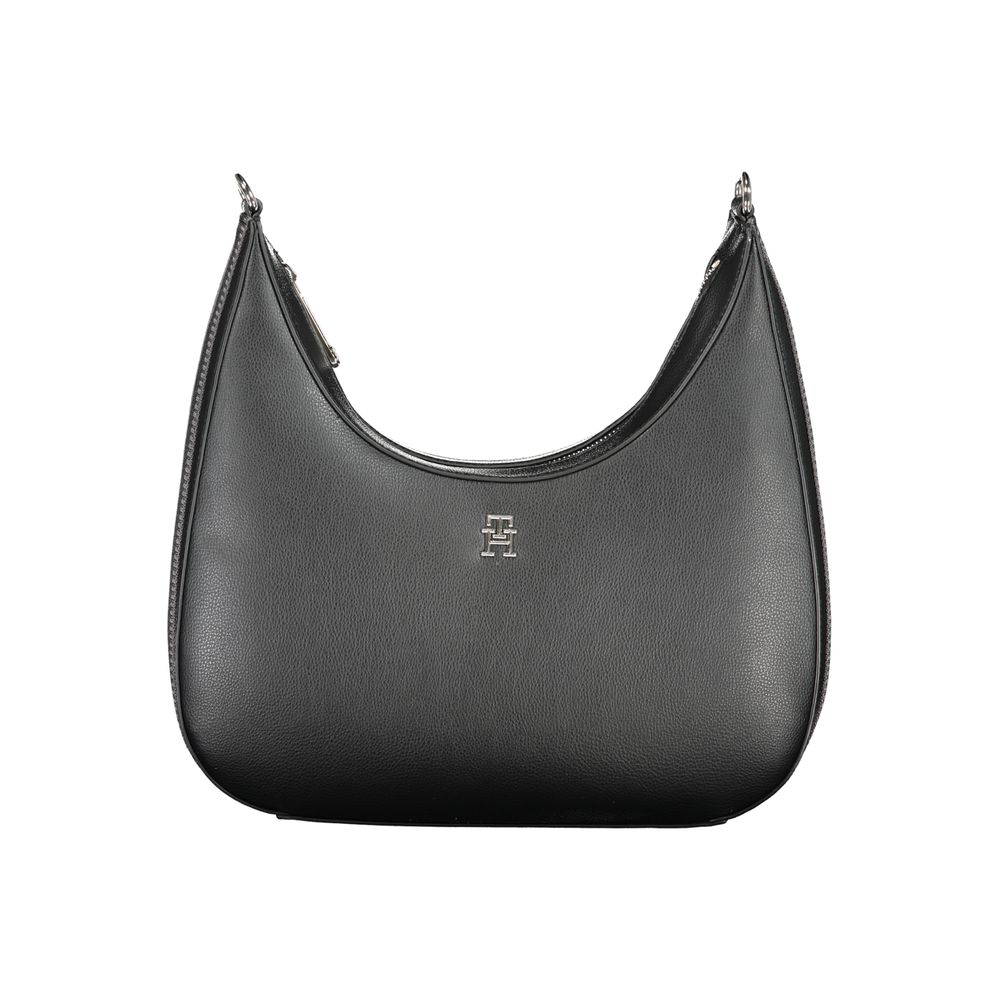 Tommy Hilfiger Black Polyester Handbag with adjustable shoulder strap, internal pocket, contrasting details, and zip closure.