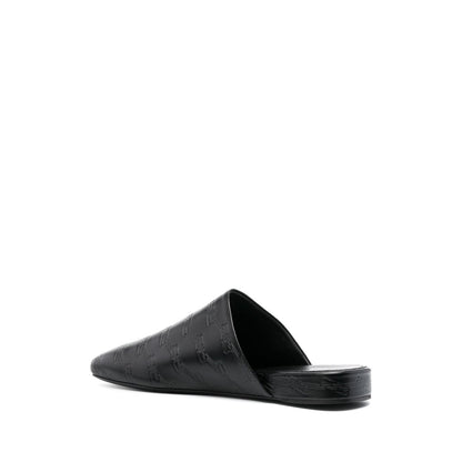 Balenciaga debossed-logo leather mules