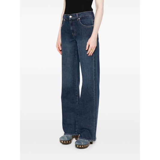 Seven Jeans Blue navy denim wide-leg jeans with button fly and five pockets.
