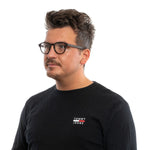 Man wearing Ermenegildo Zegna Brown Men Glasses Frame with plastic round full-rim design, stylish look for men.
