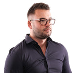 Man wearing Lozza Brown Unisex Glasses Frame with full-rim brown plastic design, ideal for stylish look. Includes branded case.