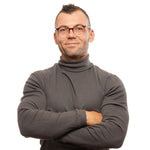 Man wearing Bally Brown Unisex Glasses Frame in a confident pose.