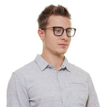 Police Black Men Glasses Frame in metal & plastic, full-rim, trapezium style. Ideal for men seeking modern eyewear. Frame color: Black.