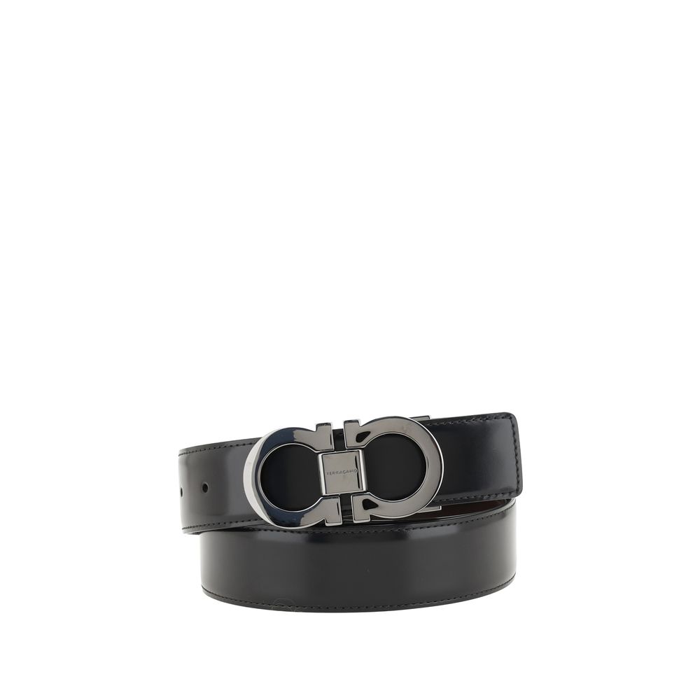 Ferragamo Black Calf Leather Bos Taurus Regular Belt with Gancini buckle, reversible design, perfect for versatile styling, AW25 collection.