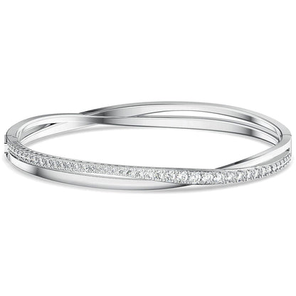 Elegant SWAROVSKI Mod. 5572725 silver bangle with crystals, perfect for ladies, featuring a sleek design and official packaging.