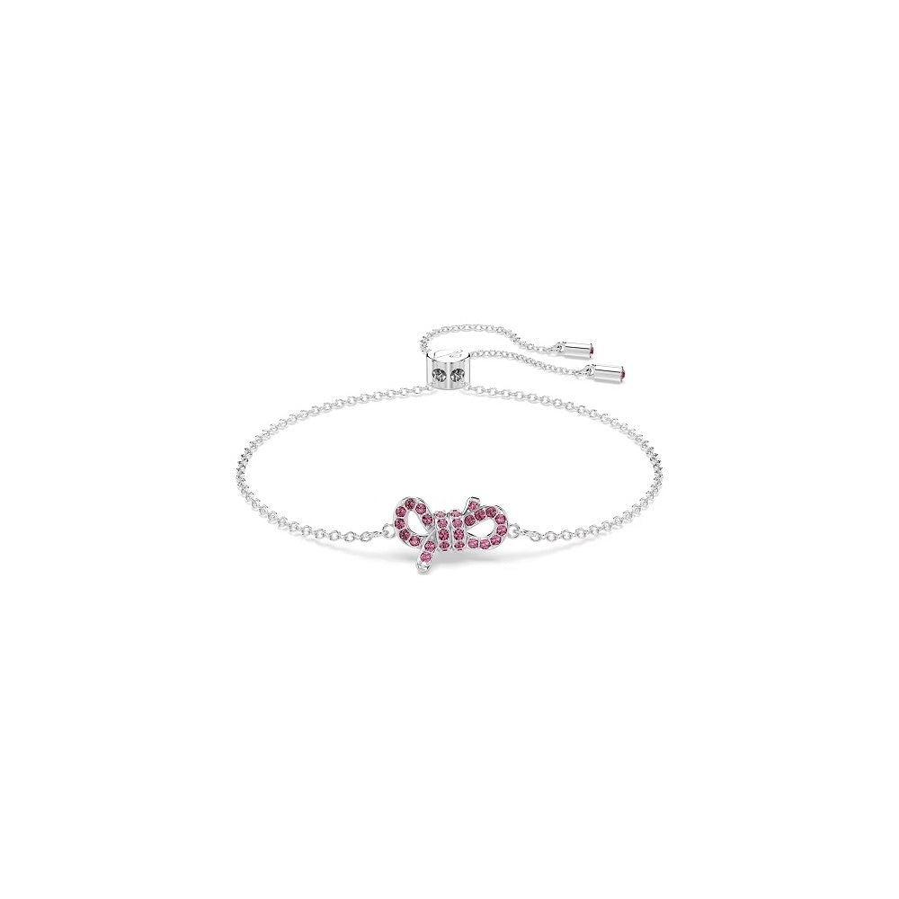 Elegant silver bracelet with pink gemstones, featuring a bow design, perfect for adding a touch of sophistication to any outfit.