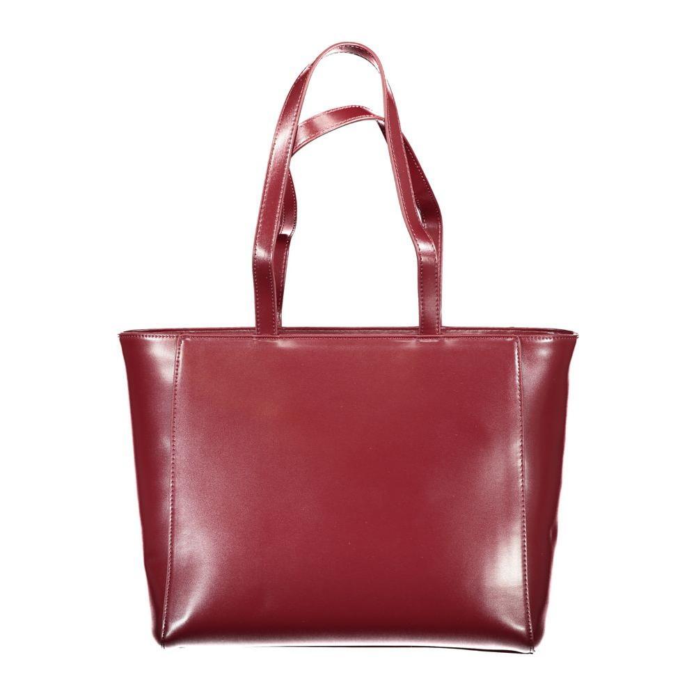 Front view with bag zipped and handles upright.