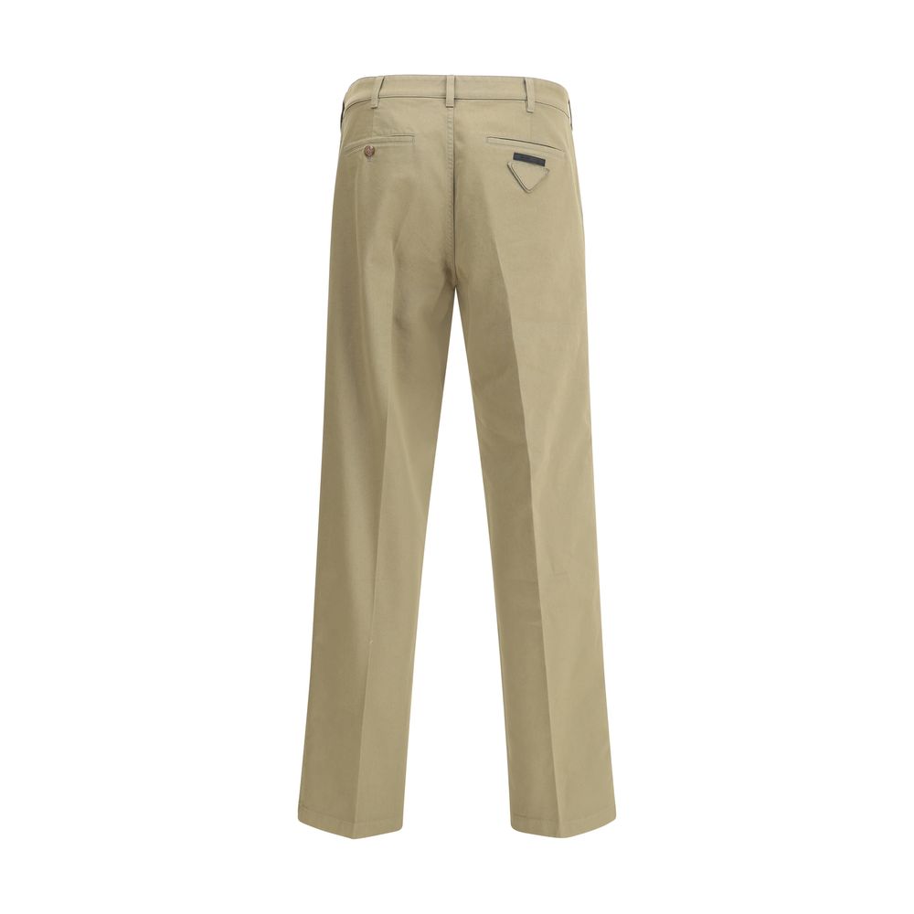 Prada Chino Pants AW25 beige chino pants with logo, zipper, and pockets for formal or casual wear.