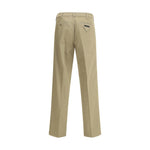 Prada Chino Pants AW25 beige chino pants with logo, zipper, and pockets for formal or casual wear.