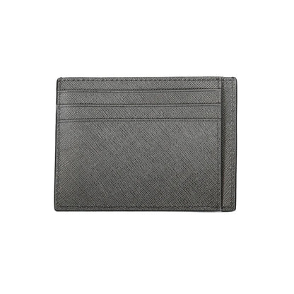 Calvin Klein Black Leather Wallet with card holder, central pocket, double card spaces, and logo detailing.