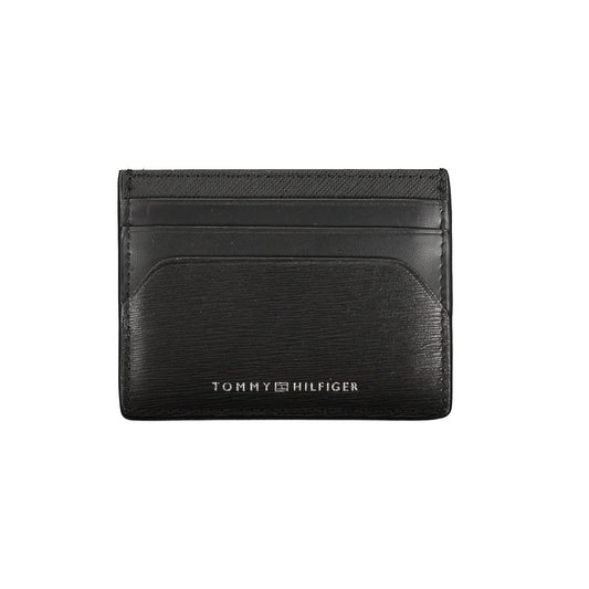 Tommy Hilfiger Black Leather Wallet with card holder, central pocket, and logo print. Stylish and functional accessory for daily use.