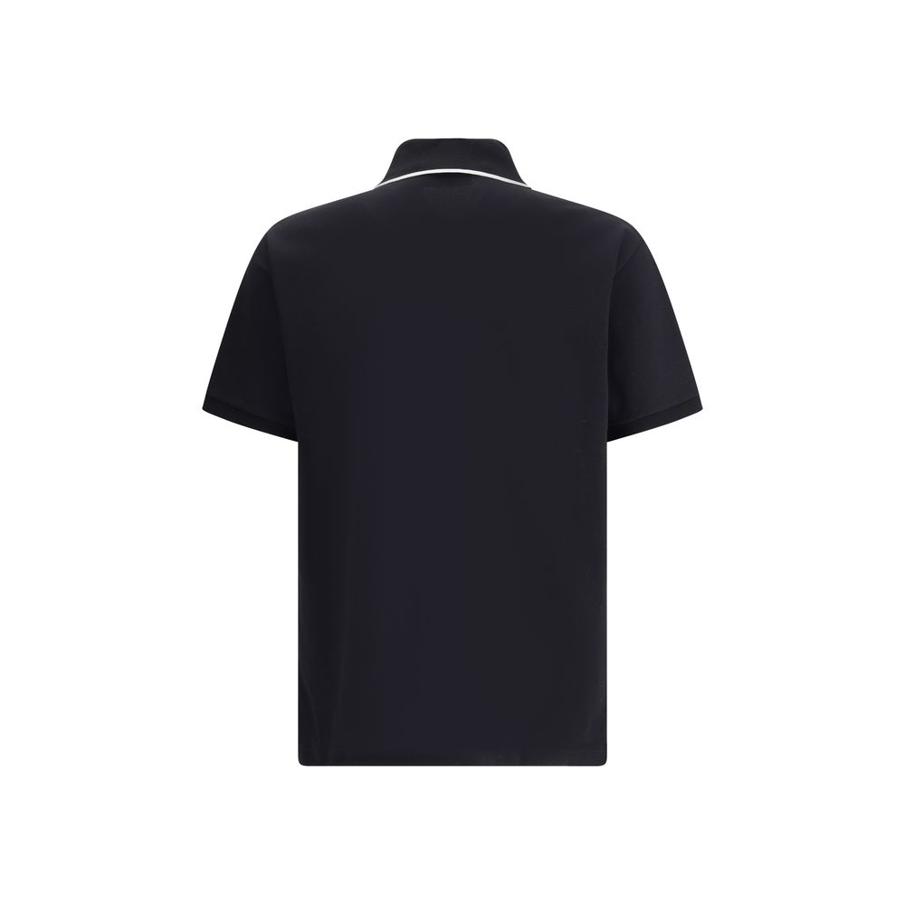 Gucci Black Cotton Polo Shirt with classic collar, front buttons, and iconic monogram. Side slits for dynamic fit, sporty elegance.