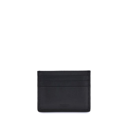 Ferragamo Black Calf Leather Bos Taurus Wallet with Gancini Card Holder, featuring palladium-finish and suede insert.