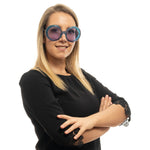 Woman wearing Emilio Pucci Turquoise Women Sunglass with purple lenses