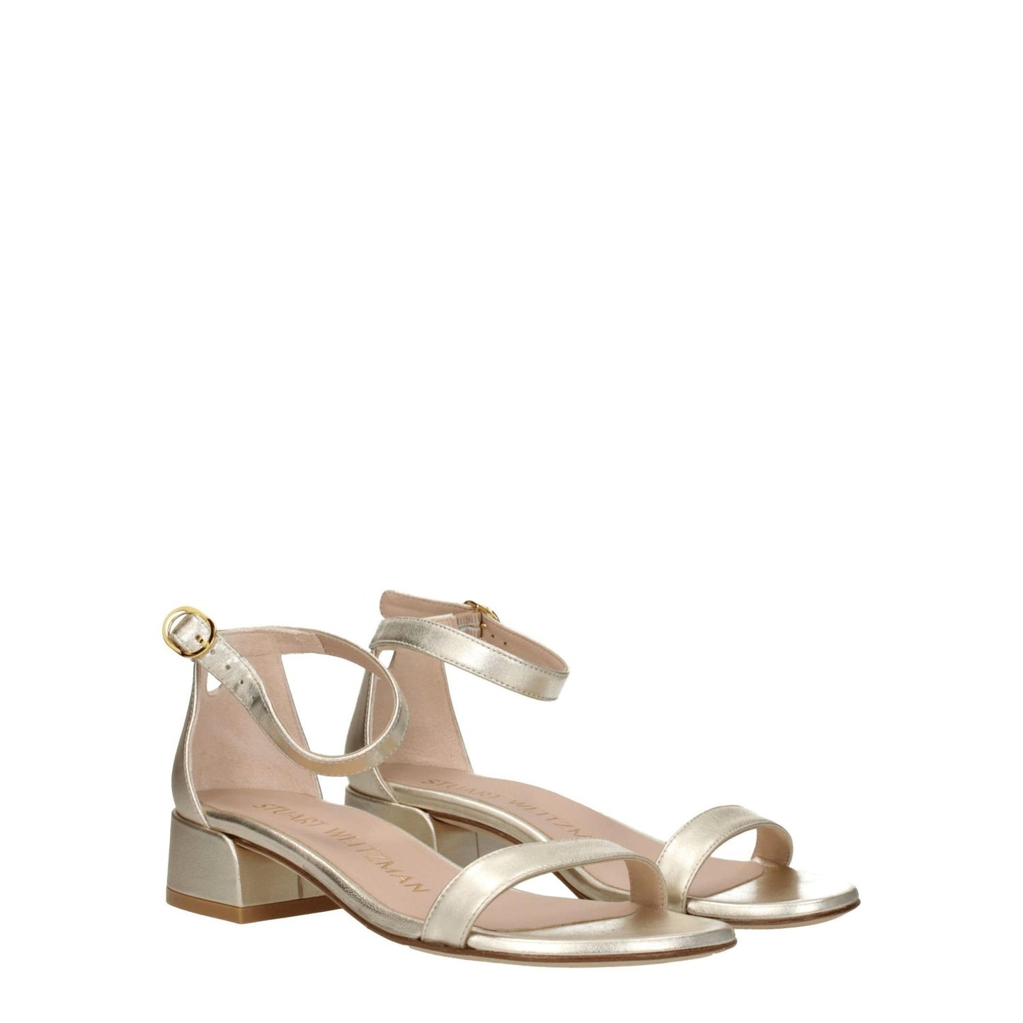Stuart Weitzman Gold Leather Flat Sandals with buckle closure and mid heels, open toe design in metallic platinum leather.
