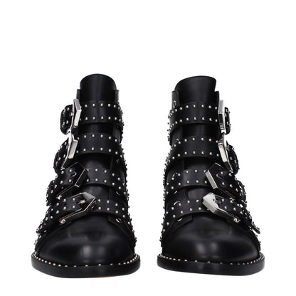 Givenchy Black Leather Ankle Boots with studs and buckle closure, featuring a low flat heel and round toe in a casual style.