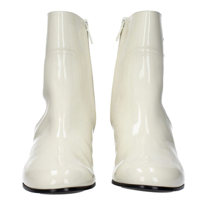 Celine Beige Leather Ankle Boots with zip closure and mid heels, featuring side logo and round toe design.
