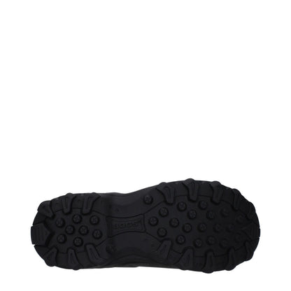 Sole view of Givenchy Black Cotton Ankle Boots with durable rubber tread, MPN BH604CH1QG001, featuring logos, round toe, and flat heel.