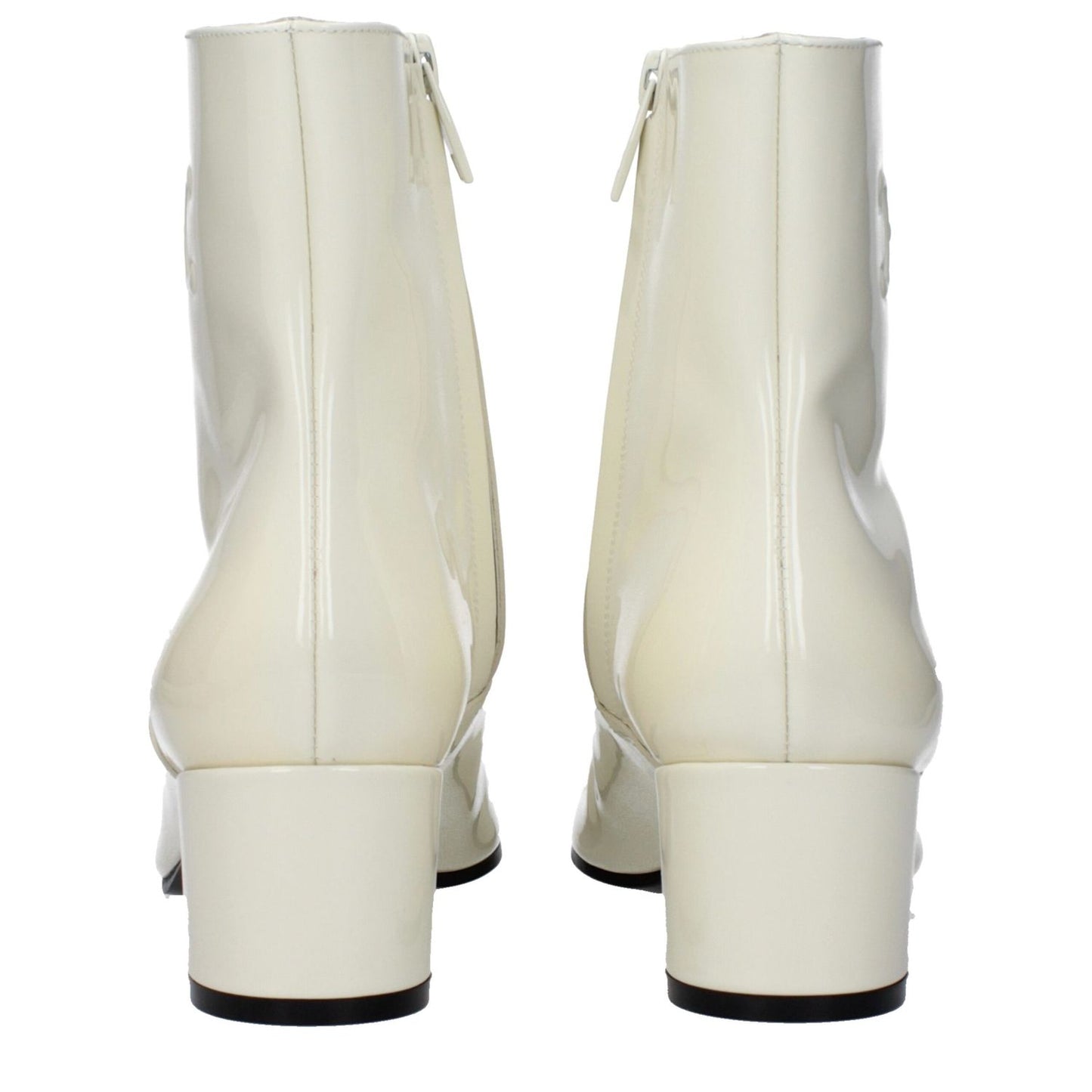 Celine Beige Leather Ankle Boots with zip closure and mid heels, featuring a side logo, viewed from the rear angle.
