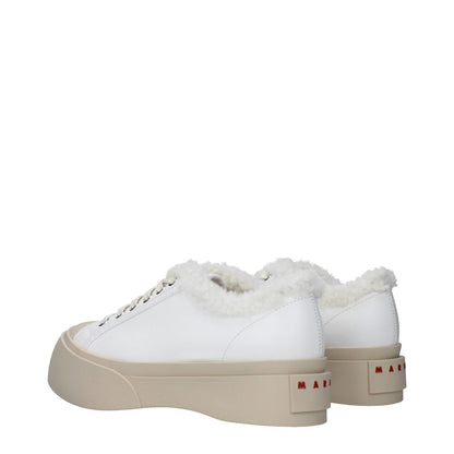 Marni White Leather Low Top Sneakers with fur detail, round toe, and mid heel. Features logos and rubber sole, casual style.