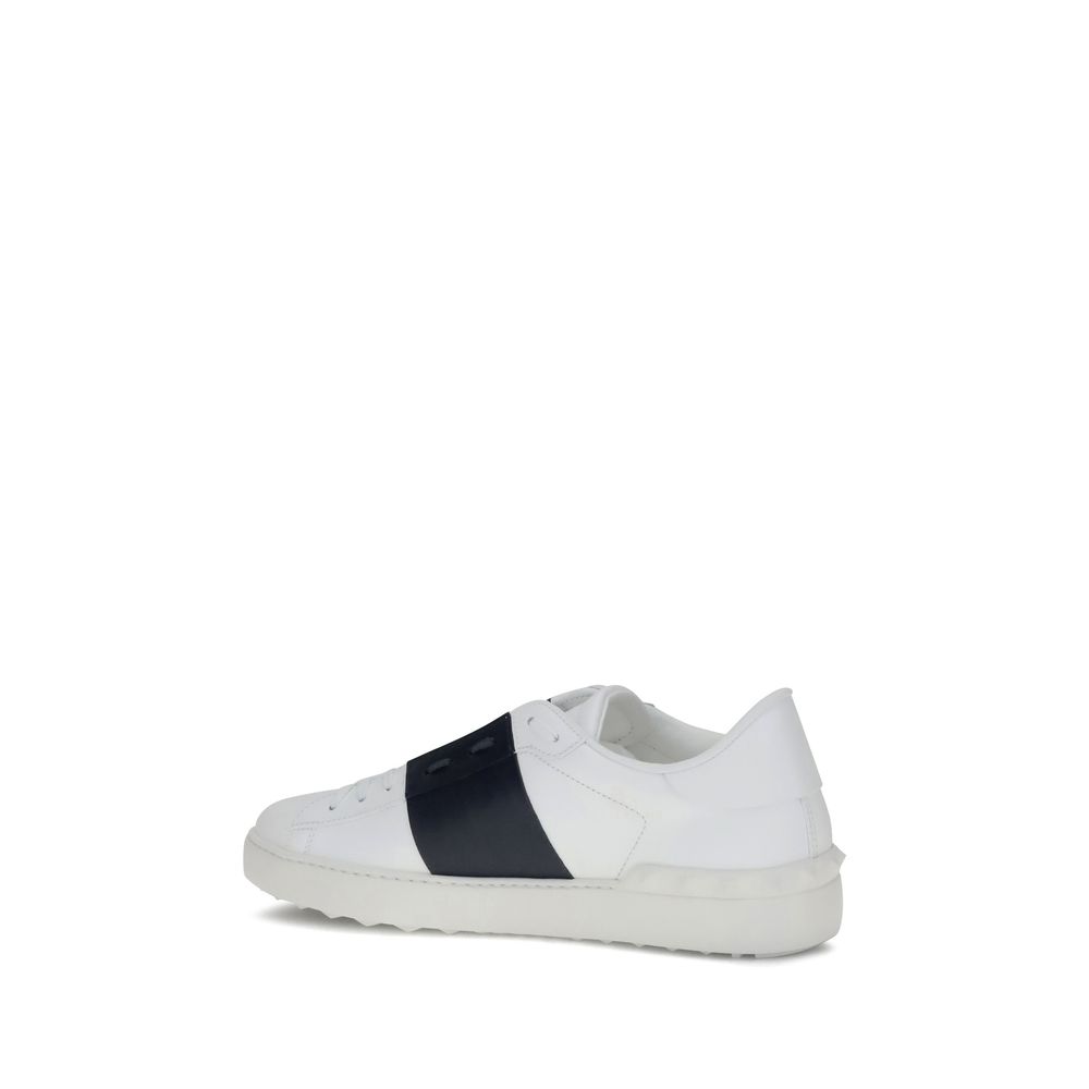 Valentino Garavani White Calf Leather Bos Taurus Low Top Sneakers with contrasting side bands and heel studs.
