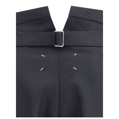 Close-up of Margiela Black Wool Dress Pants showcasing iconic stitching and buckle detail.