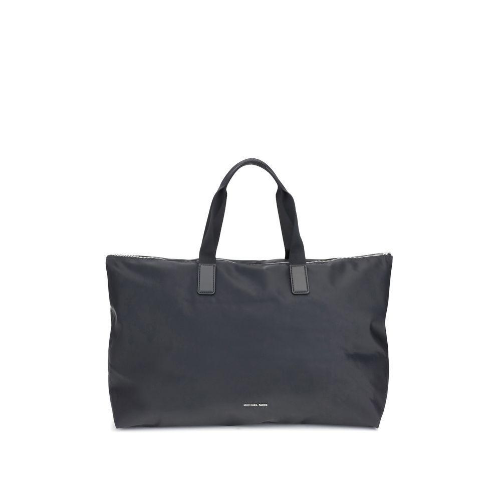 Front view with bag zipped and handles upright.
