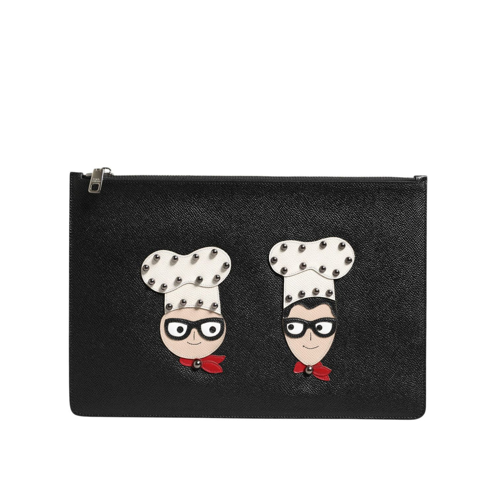 Dolce & Gabbana Black Leather #DGFAMILY Embellished Men Clutch Pouch Bag with chef graphic appliques and zipper closure.