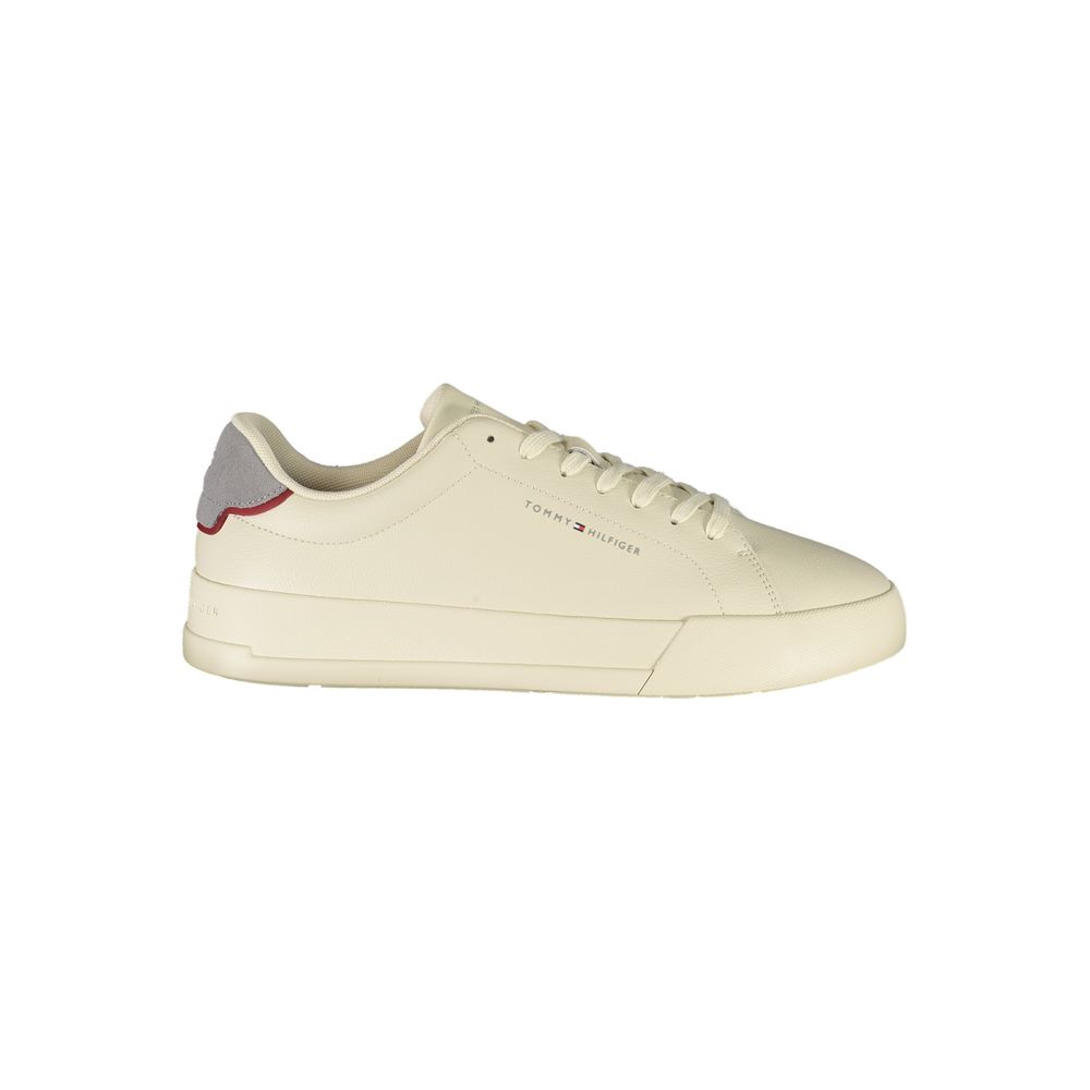 Tommy Hilfiger Beige Leather Men Sneaker with grey accents and logo, side view on white background
