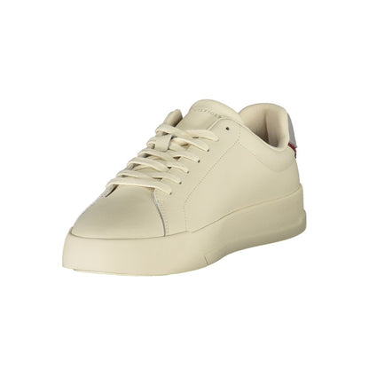 Tommy Hilfiger Beige Leather Men Sneaker with modern luxury, removable footbed, and iconic logo, perfect for casual fashion-forward style.