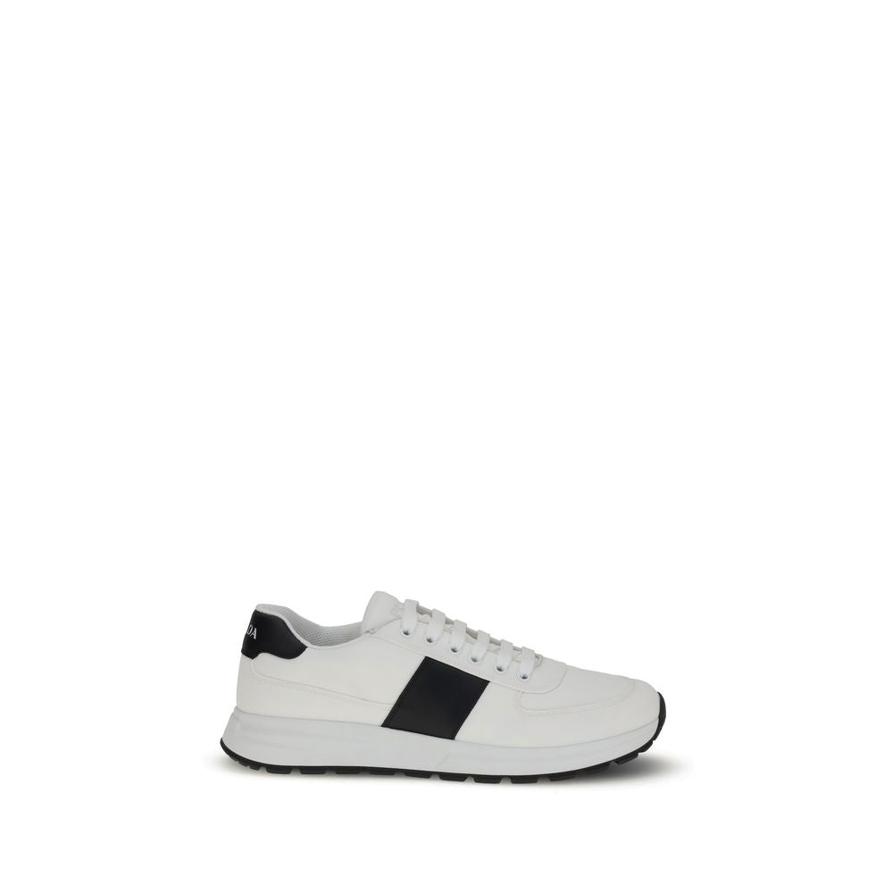 Prada Leather Sneakers in two-tone design with lace-up closure and branded logo, featuring calf leather and rubber sole for AW25.