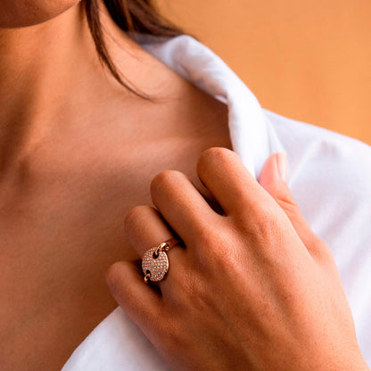 Close-up of a hand wearing AN JEWELS JEWELRY Mod. AL.RJT01RC-7 ring on a white shirt background