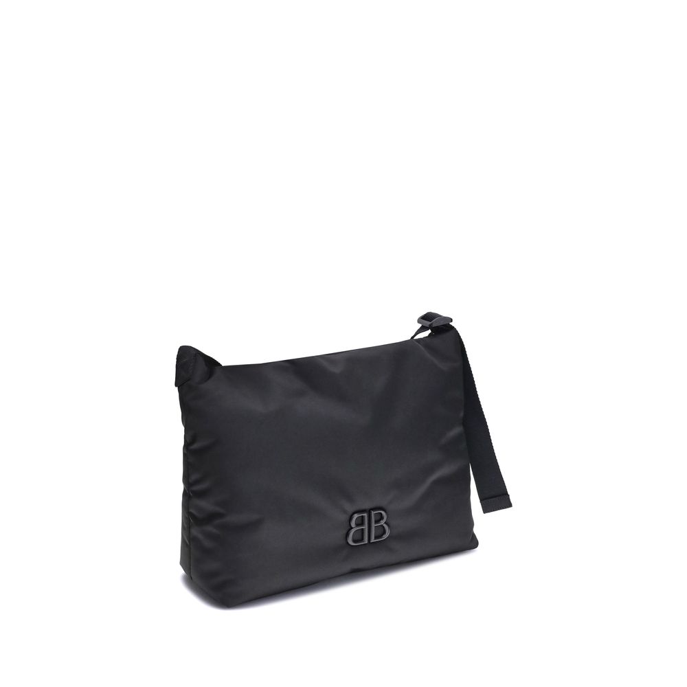 Balenciaga Black Fabric Shoulder Bag with BB logo, flat strap, and magnetic flap closure, ideal for everyday use.
