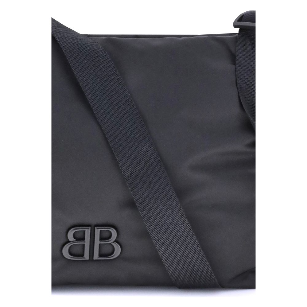 Balenciaga Black Fabric Shoulder Bag with BB logoed magnetic flap closure, featuring a flat shoulder strap for everyday use.