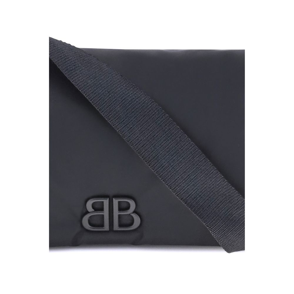 Close-up of Balenciaga Black Polyamide Shoulder Bag with logo and strap detail.
