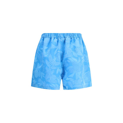 Balenciaga Blue Viscose Bermuda Shorts with floral pattern, elastic waistband, and side pockets, perfect for bold summer style.