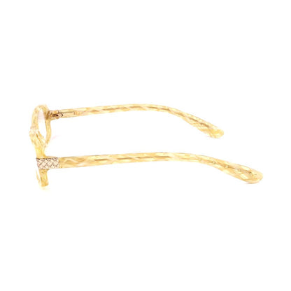 Bottega Veneta Yellow Acetate Glasses (Frames) side view showing intricate design and acetate material in yellow color.