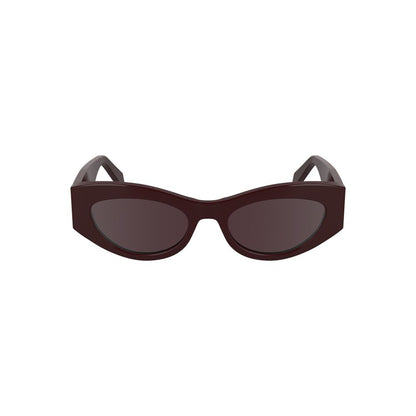 Calvin Klein Red Acetate Women Sunglasses with cat eye shape and brown lenses for a bold, stylish look.
