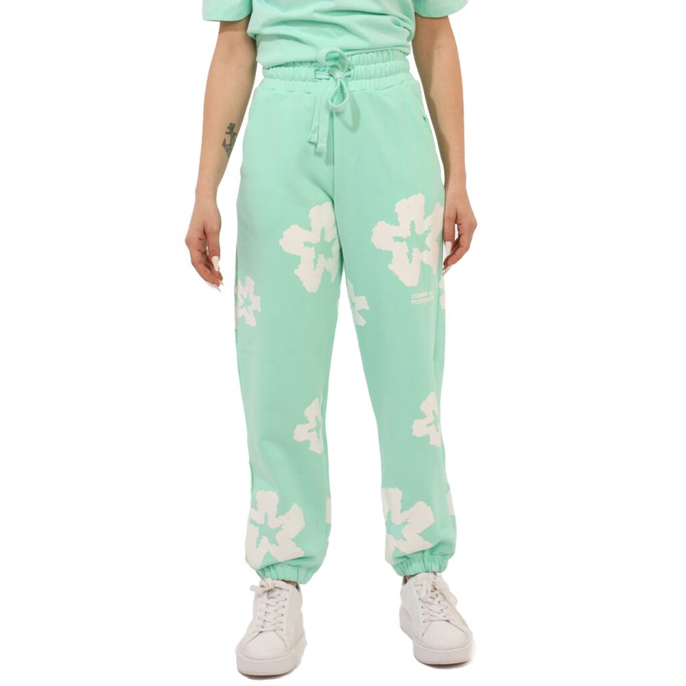 Comme Des Fuckdown Green Cotton Jeans & Pant with prints, elastic waistband, and drawstring, styled with sneakers.