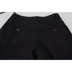 Back view of Dolce & Gabbana Black High Waist Skinny Trouser STAFF Pants showcasing button details, made in Italy.