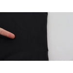 Close-up of Dolce & Gabbana Black High Waist Skinny Trouser STAFF Pants showing fabric texture and pulled threads.