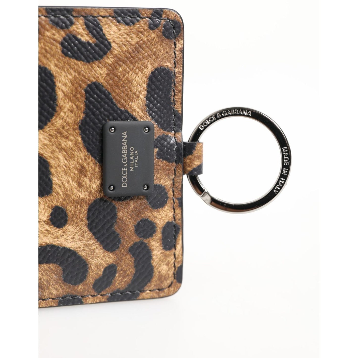 Close-up of Dolce & Gabbana Leopard Print Leather Embossed Lanyard Card Holder Wallet with logo detail.