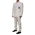 Dolce & Gabbana Light Cream Linen Embroidered 2 Piece Suit with DG crest patch, two-button closure, tailored fit, formal wear for luxury occasions.