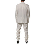 Dolce & Gabbana Light Cream Linen Embroidered 2 Piece Suit shown from the back, featuring a tailored fit and elegant design.