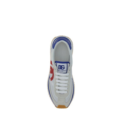 Top view of Dolce & Gabbana Multicolor Rubber Low Top Sneakers featuring a lace-up front and printed logo on the tongue.