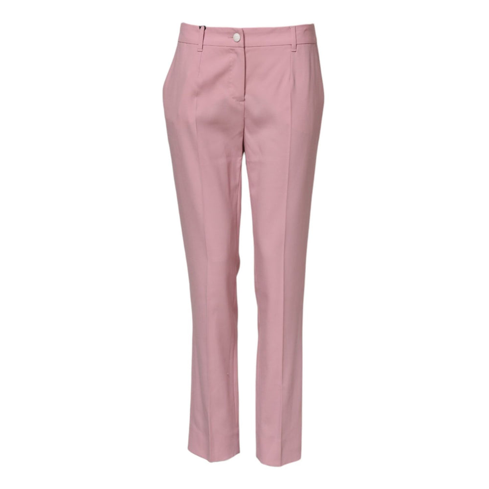Dolce & Gabbana Pink Wool Mid Waist Tapered Pants with button closure, made from 99% virgin wool, showcasing Italian craftsmanship.