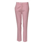 Dolce & Gabbana Pink Wool Mid Waist Tapered Pants with button closure, made from 99% virgin wool, showcasing Italian craftsmanship.