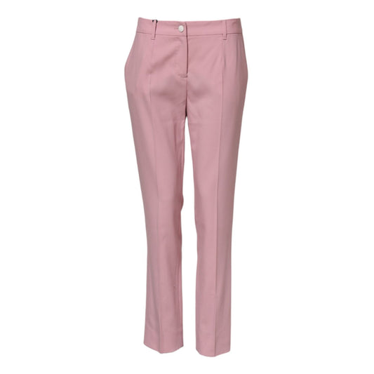 Dolce & Gabbana Pink Wool Mid Waist Tapered Pants with button closure, made from 99% virgin wool, showcasing Italian craftsmanship.