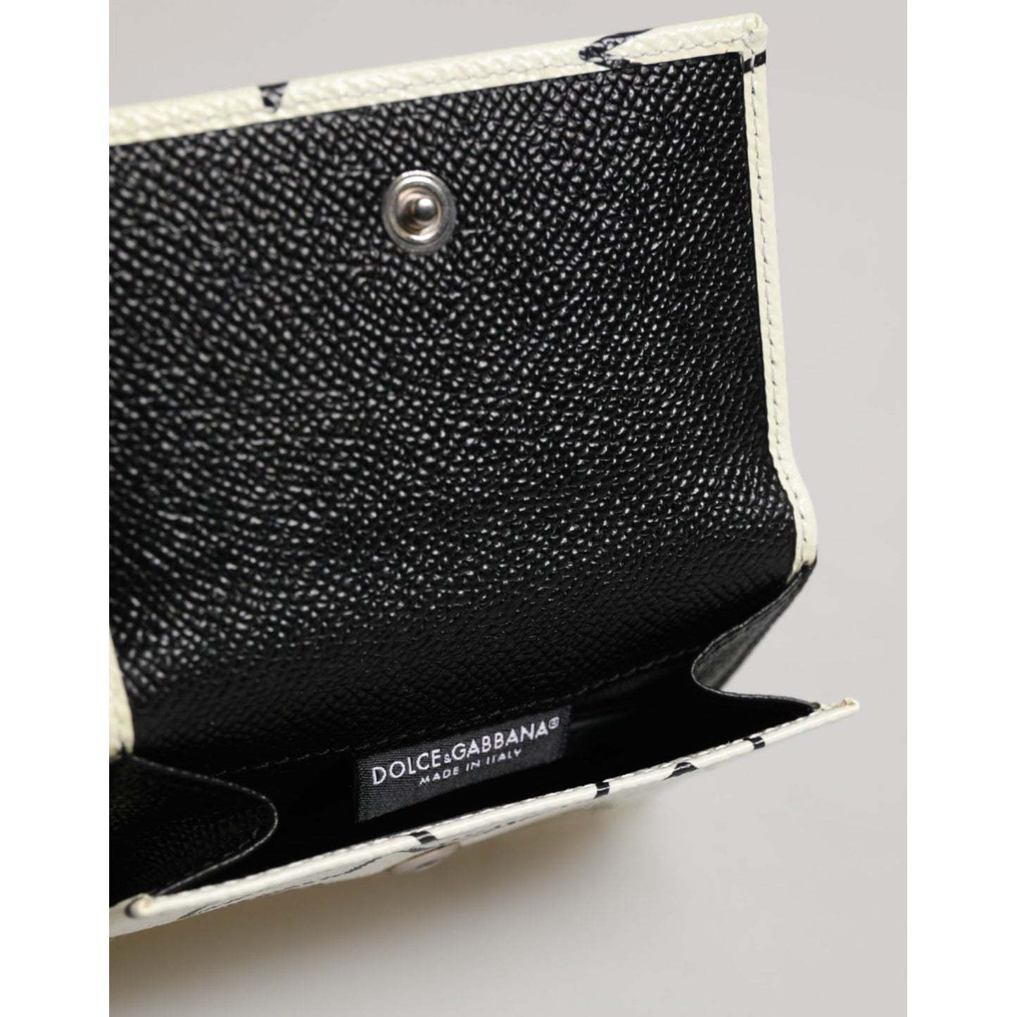 Dolce & Gabbana White Leather Trifold DG Star Print Card Holder Wallet interior view, showcasing luxurious craftsmanship.