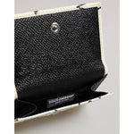 Dolce & Gabbana White Leather Trifold DG Star Print Card Holder Wallet interior view, showcasing luxurious craftsmanship.
